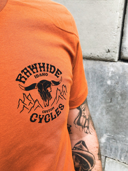 Rawhide Cycles x Matt Sabbath Cowskull Tee in Vintage Orange