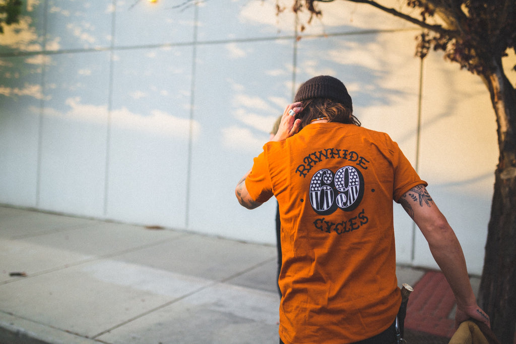 Rawhide Cycles x Austin Maples 69 Tee in Vintage Orange